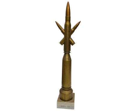 A Trench Art Piece fashioned from Inert Brass and Copper Shell Casings on a square socle aluminium, stamped "Hill 62" (Ypres,