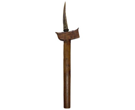 A Vintage Kris, with Hardwood Scabbard and Cross Guard with Stag Handle, and typical wavy edged blades.Overall length 51cm