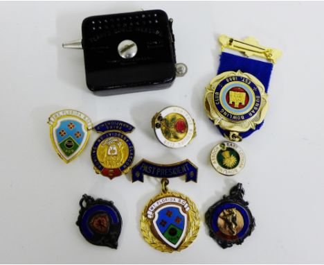 A small selection of vintage Bowling club badges to include two silver fobs and a small selection of enamel club badges toget