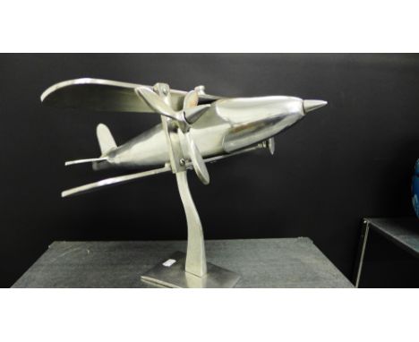An aluminium model of a twin engine bi-plane, 32cm high