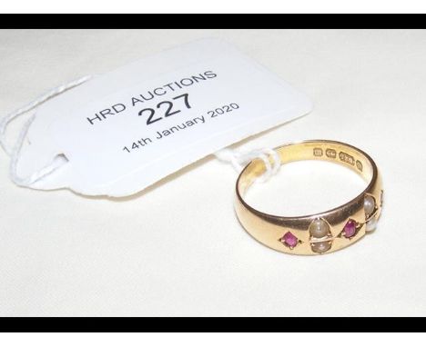 A ruby and seed pearl ring in 15ct gold setting CONDITION REPORTSize R