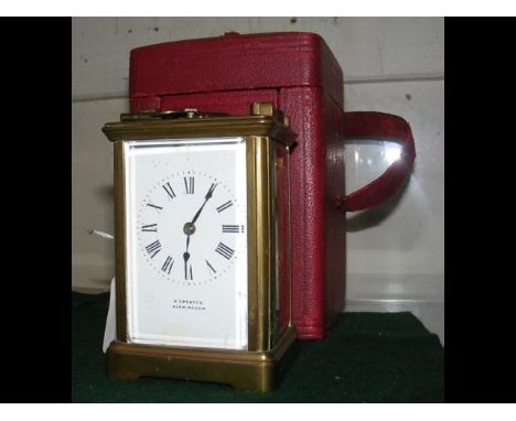 A brass cased repeater carriage clock by Greaves of Birmingham - 12cm high - with leather carrying case  CONDITION REPORThas 