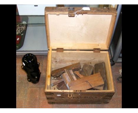 Selection of old woodworking planes, together with a studio glass vase 