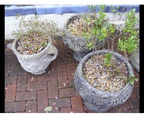 A pair of garden plant pots, together with one other in the shape of a teapot 