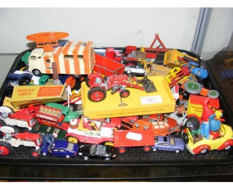 A tray of collectable die-cast model vehicles, including the French Dinky Toy tractor 