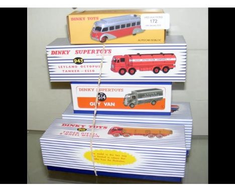 Four boxed reproduction Dinky Supertoys, together with a boxed reproduction Dinky Toy Auto Car