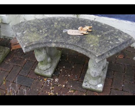 A curved garden bench 