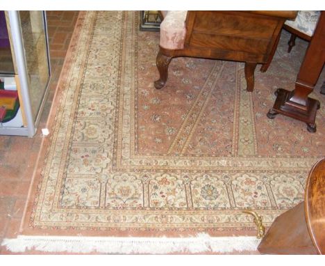 A Middle Eastern style carpet with geometric floral border - 380cm x 280cm 