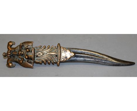 AN ELABORATE 19TH CENTURY INDIAN DAGGER, with curved steel blade and pierced copper handle, 9.5in long.