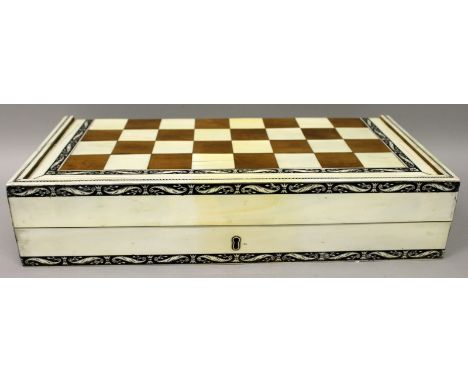 A FINE QUALITY & UNUSUAL EARLY 19TH CENTURY ANGLO-INDIAN VIZAGAPATAM IVORY, EBONY & SANDALWOOD FOLDING CHESS & BACKGAMMON BOA