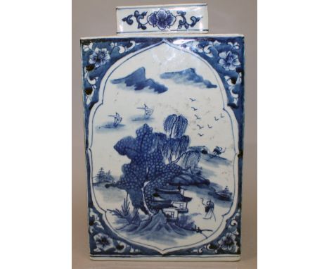 A LARGE CHINESE BLUE & WHITE PORCELAIN TEA CADDY & COVER, the square-section body decorated with river landscape panels, the 