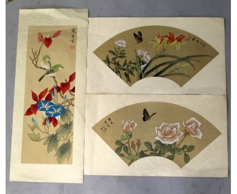 A GROUP OF THREE 20TH CENTURY CHINESE PAINTINGS ON SILK, one rectangular and two of fan-form, each with a patterned silk moun