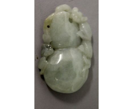 A SMALL CHINESE CELADON GREEN JADE PENDANT, in the form of a bat and a chilong clinging to a gourd, 1.5in high.