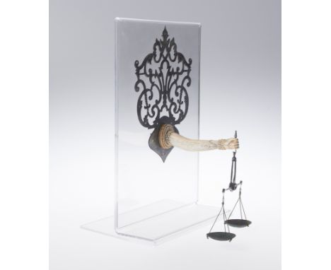 Jeweller’s scales, or emblem of justice in the shape of an arm made of ivory and wrought iron.  Possibly from Sri Lanka. 19th