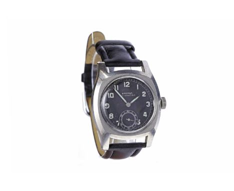 GENTLEMAN'S MILITARY ETERNA ANTI MAGNETIQUE STAINLESS STEEL MANUAL WIND WRIST WATCHthe round black dial with Arabic numerals 