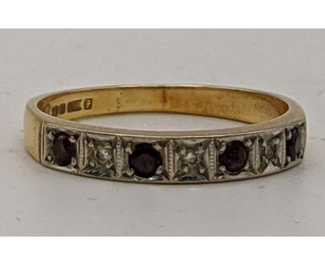 An 18ct gold diamond and ruby ring, 2.5gLocation: 