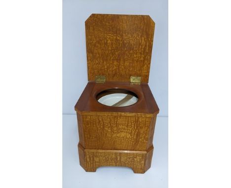 A fine late 19th century rippled ash commode with pull out step by Christopher Pratt &amp; Sons, Bradford, 43.5cm high x 45.5