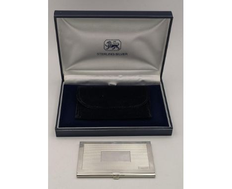 A silver Mappin &amp; Webb card case having an engine turned front, hallmarked Birmingham 2012, 58.9g, Location: 