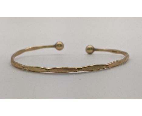 A 9ct gold bangle, 6.1gLocation: 
