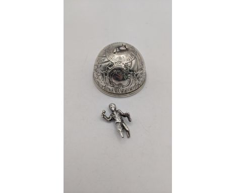 A silver bell having engraved decoration, having a finial fashioned as a boy A/FLocation: 