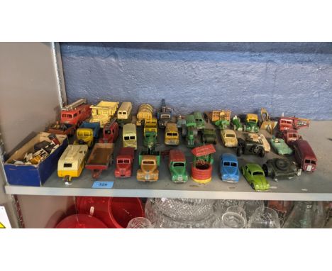 A quantity of loose Dinky toys, to include; a Euclid Rear Dump Truck (965) two Commer Dinky Service breakdown lorries, street