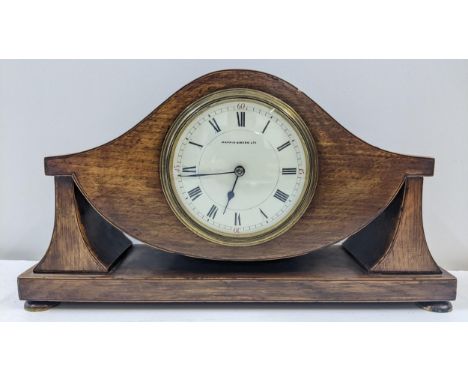 An Edwardian inlaid, oak cased mantle clock with an enamel dial, Location: 