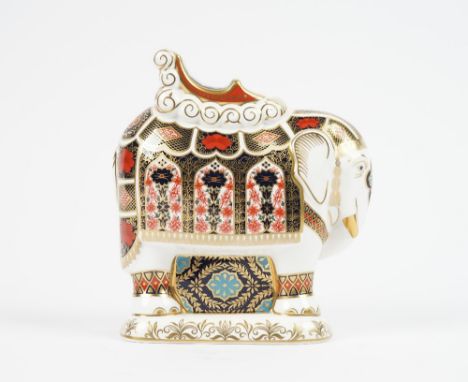 A Royal Crown Derby Imari decorated 'Elephant' paperweight, gold button to base, red printed marks, 21cm high. 