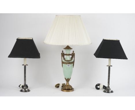 A pair of Victorian style silver plated candlestick lamps, 28cm high and a Victorian style green porcelain and gilt metal mou