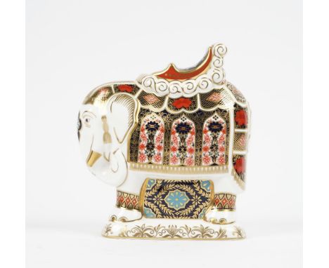 A Royal Crown Derby Imari decorated 'Elephant' paperweight, gold button to base, red printed marks, 21cm high. 