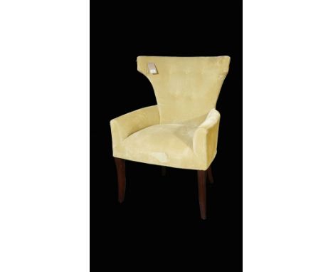 Lewis Mittman, a modern green upholstered wingback armchair on ebonised square supports, 69cm wide x 101cm high, together wit