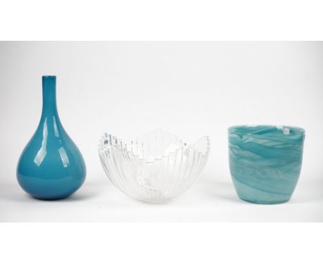 An Orrefors clear glass bowl of segmented form, 30cm diameter, a modern blue glass bottle neck vase and a modern blue glass b