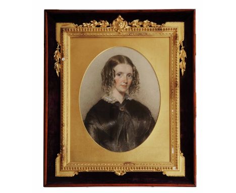 CIRCLE OF GEORGE RICHMOND (1809-1896) Bust length portrait of Martha Rogers of Buckingham, her shoulder length hair with ring