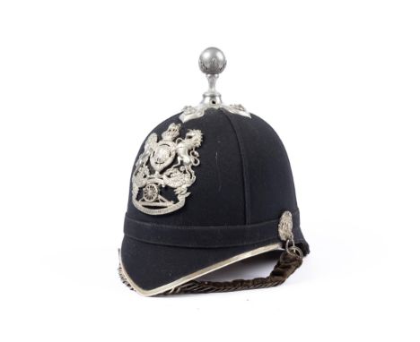 A Victorian Artillery Volunteer officer's blue home service helmet, silver plated mounts. GC £300-350 