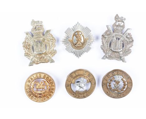 Six helmet plate centres: Royal Scots with central backing plate, South Wales Borderers, Victorian K.O.S.B. (2, one with loop