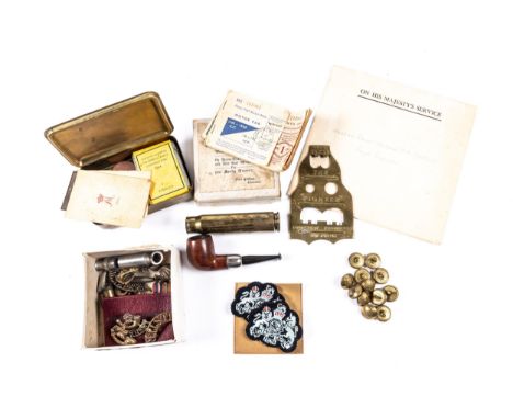 A small group of the vendor's family memorabilia, including a Princess Mary's gift tin containing unopened packet of tobacco,