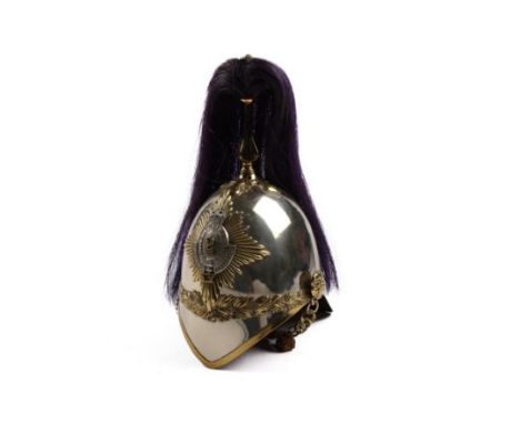 A fine example of a Trooper's helmet of the 2nd County of London Imperial Yeomanry, c 1902, brass mounts, purple horse hair p