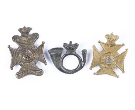 A pre 1881 blackened glengarry badge of the King's Royal Rifle Corps; a Victorian glengarry badge of the K.R.R.C. Militia; an
