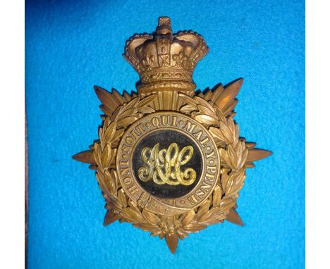 A Victorian officers helmet plate of the Army Service Corps, GC (no gilt remaining), mounted in a glazed wooden case. £50-80 