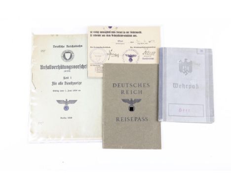 A Third Reich Deutsches Reich Wehrpass, dated 1939, another with Heer stamp dated 1937; an ID card "Ausmusterungsschein" with