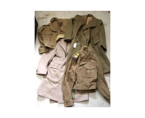 A Royal Army Service Corps officer's BD khaki uniform, a shirt, a "British Warm" officer's greatcoat and a khaki greatcoat, a