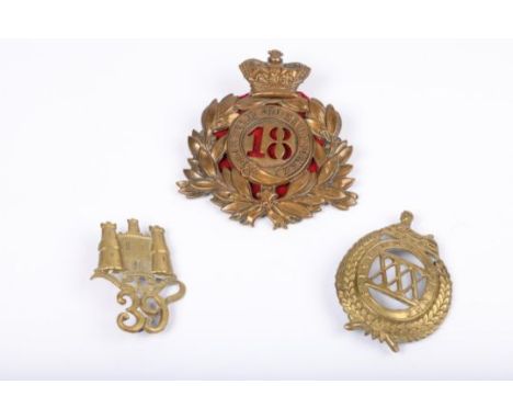 An 1869 pattern OR's shako badge of the 18th (Royal Irish) Regiment; a pre 1881 OR's glengarry badge of the XXXth (Cambridges