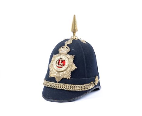 A post 1902 OR's home service blue cloth helmet of the Royal Berkshire Regiment, brass mounts, dated inside "4. 13", GC £200-