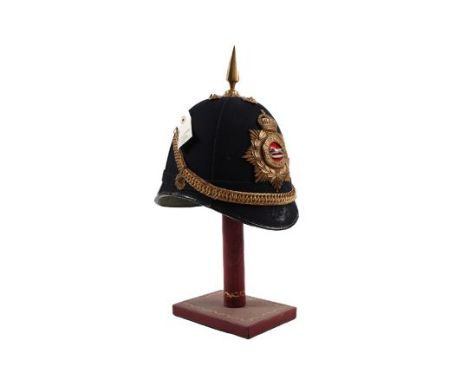 A post 1902 OR's Home Service helmet of the West Yorkshire Regiment, blue cloth with brass mounts, lining nicely marked "1Y" 