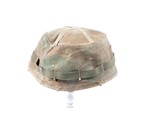 A Third Reich camouflaged helmet cover, possibly for a Fallschirmjager helmet, GC (some wear and tear). £200-250 