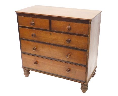 A 19thC oak chest of drawers, the top with a moulded rim above two short and three long drawers, each with turned wood handle