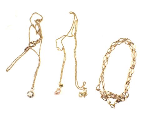Three various yellow metal pendants and chains, comprising a pink cultured pearl and tiny diamond set pendant, yellow metal s