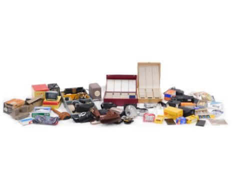 A quantity of cameras, photographic slides, ceramic animals, boxed cameras, etc. (3 trays) 