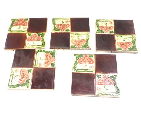 Five Art Nouveau ceramic wall tiles, each of four sectional box design, with treacle panels and pink flowers, 15cm x 15cm. 