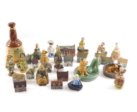 A quantity of Wade Whimsies, buildings, a pipe stand, small decanter (lacking contents), etc. 