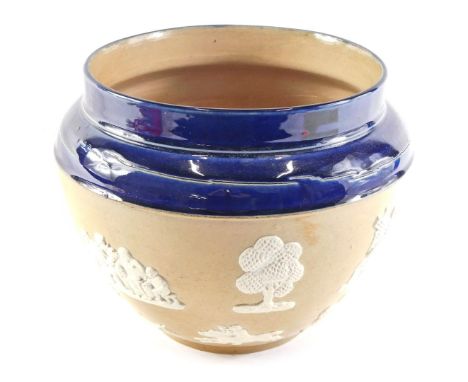 A Doulton Lambeth stoneware jardiniere, decorated in relief with hunting and tavern scenes, a windmill, etc., impressed marks